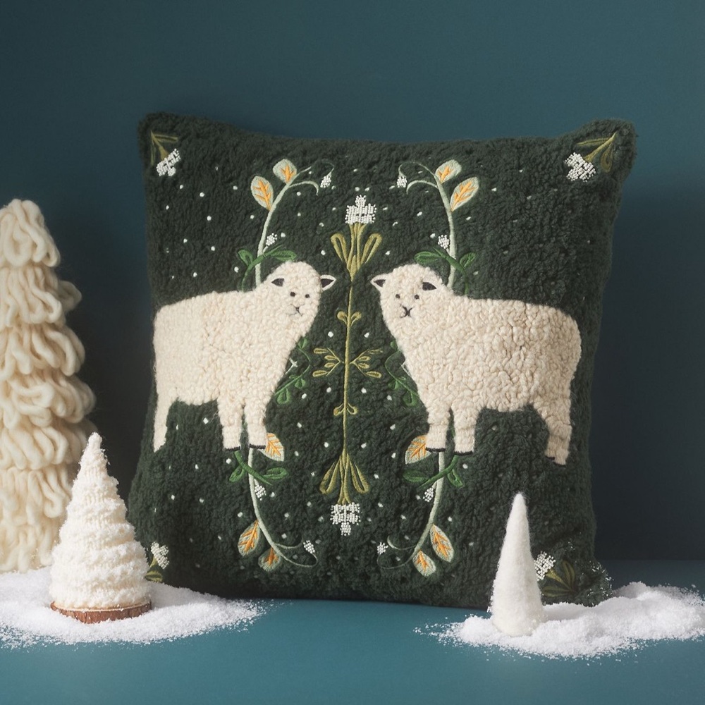 Mila embroidered faux-shearling pillow.
Anthropologie SHEEP Holiday Pillow NWT